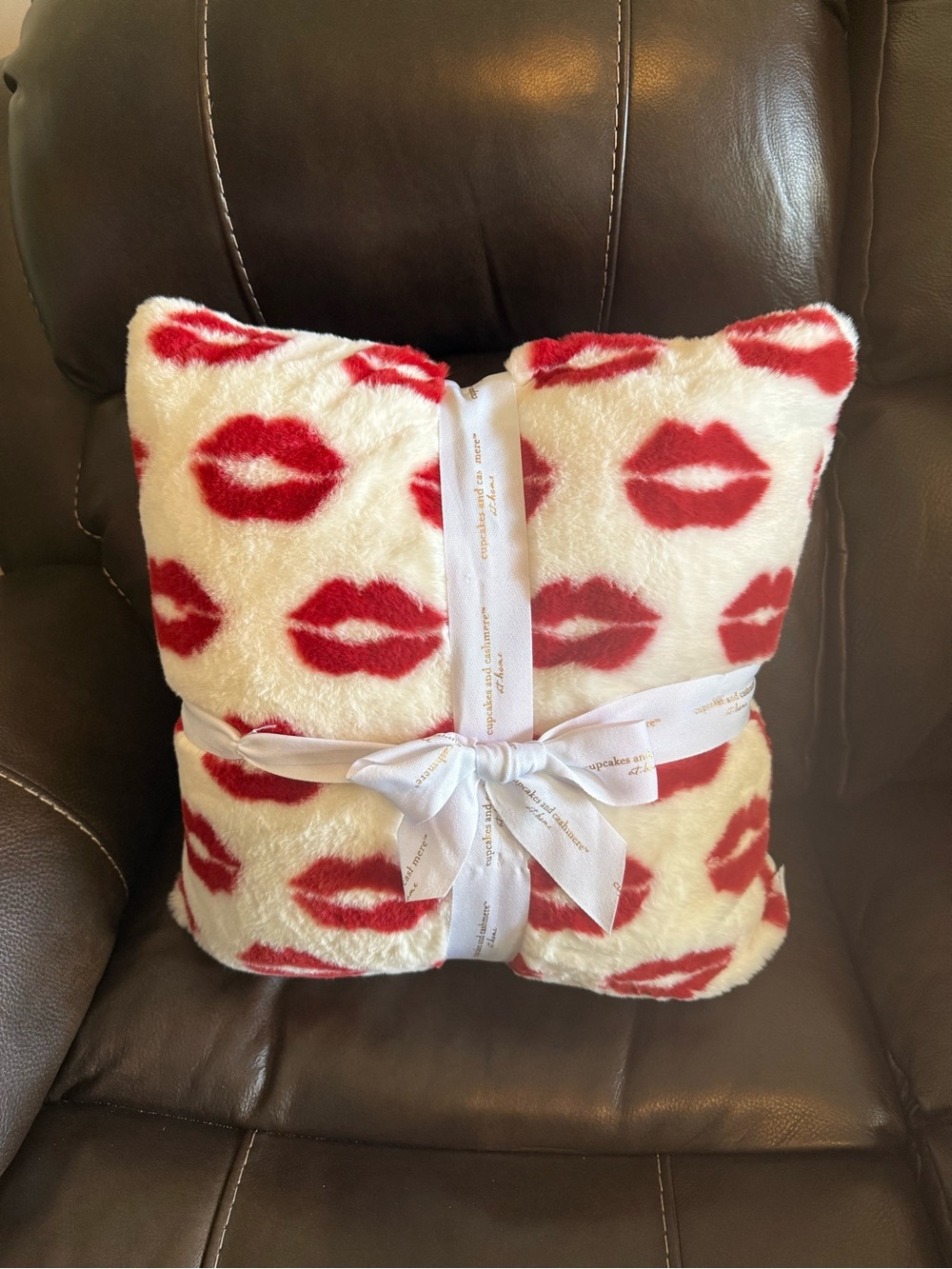 cupcakes & cashmere White Faux Fur Plush Pillow with Red Lip Print